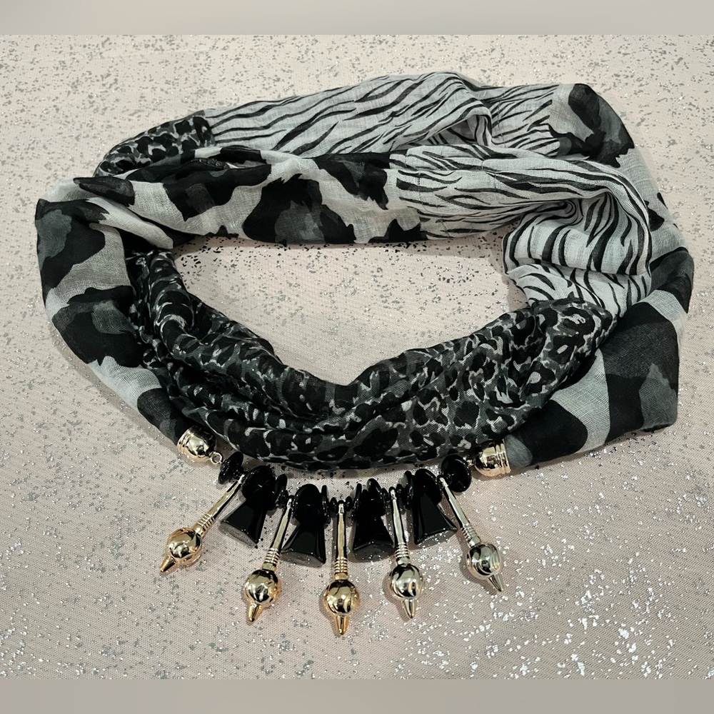 Elegant Black and Gray Scarf with Gold Accents